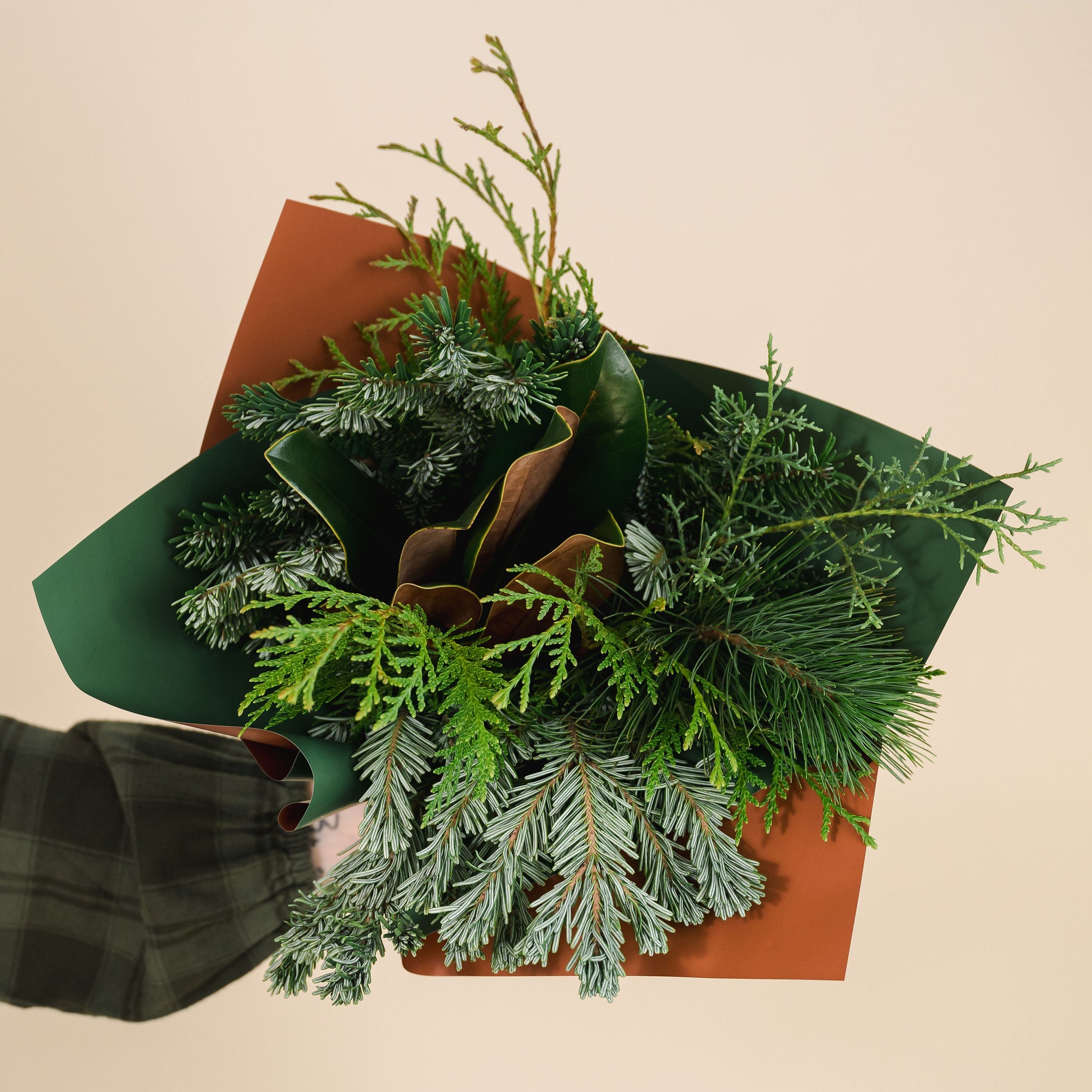 bouquet of mixed winter greenery