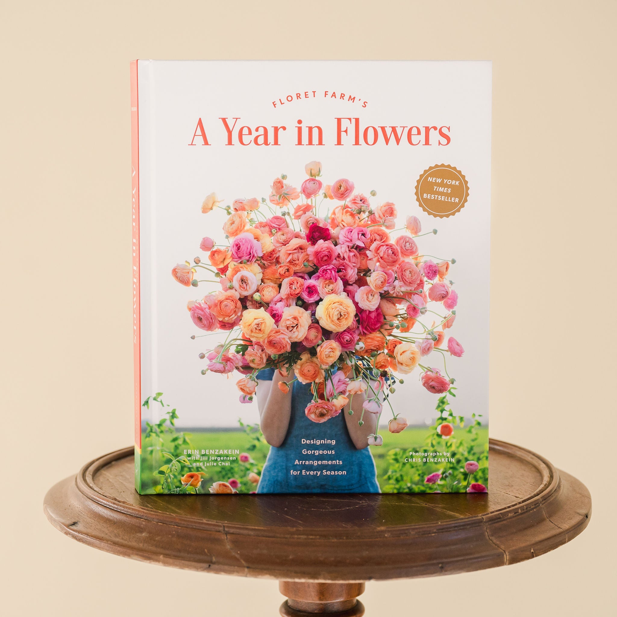 front cover of A Year in Flowers sitting on a wooden stool