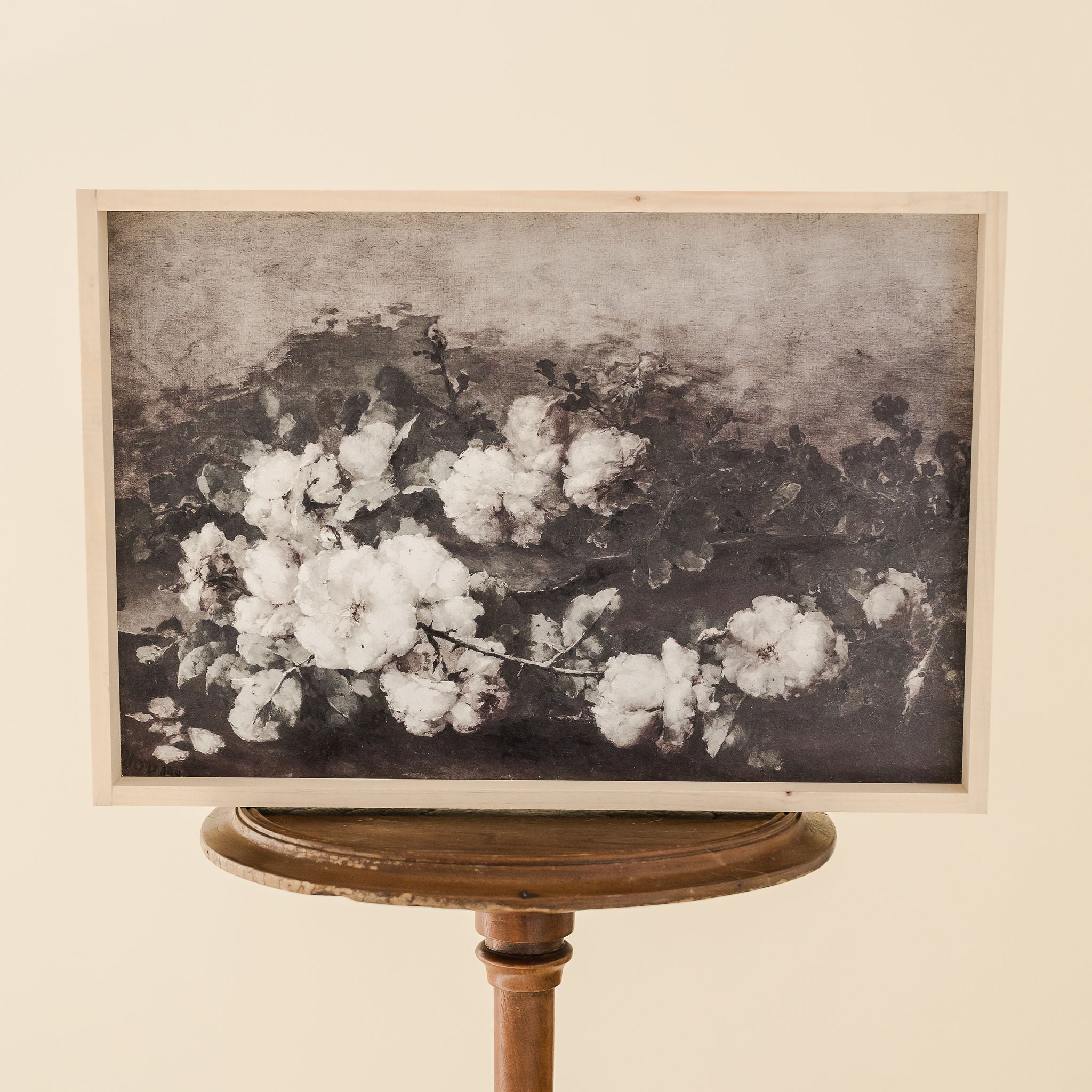 framed print of a white flowering branch