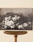 framed print of a white flowering branch